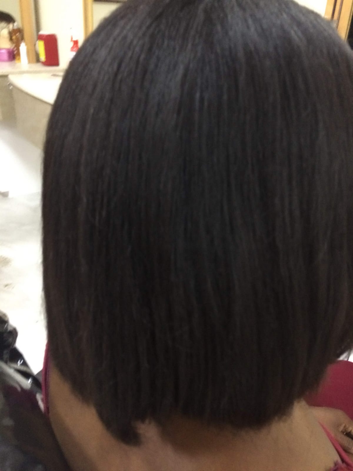 Previous straightened hairstyle from behind