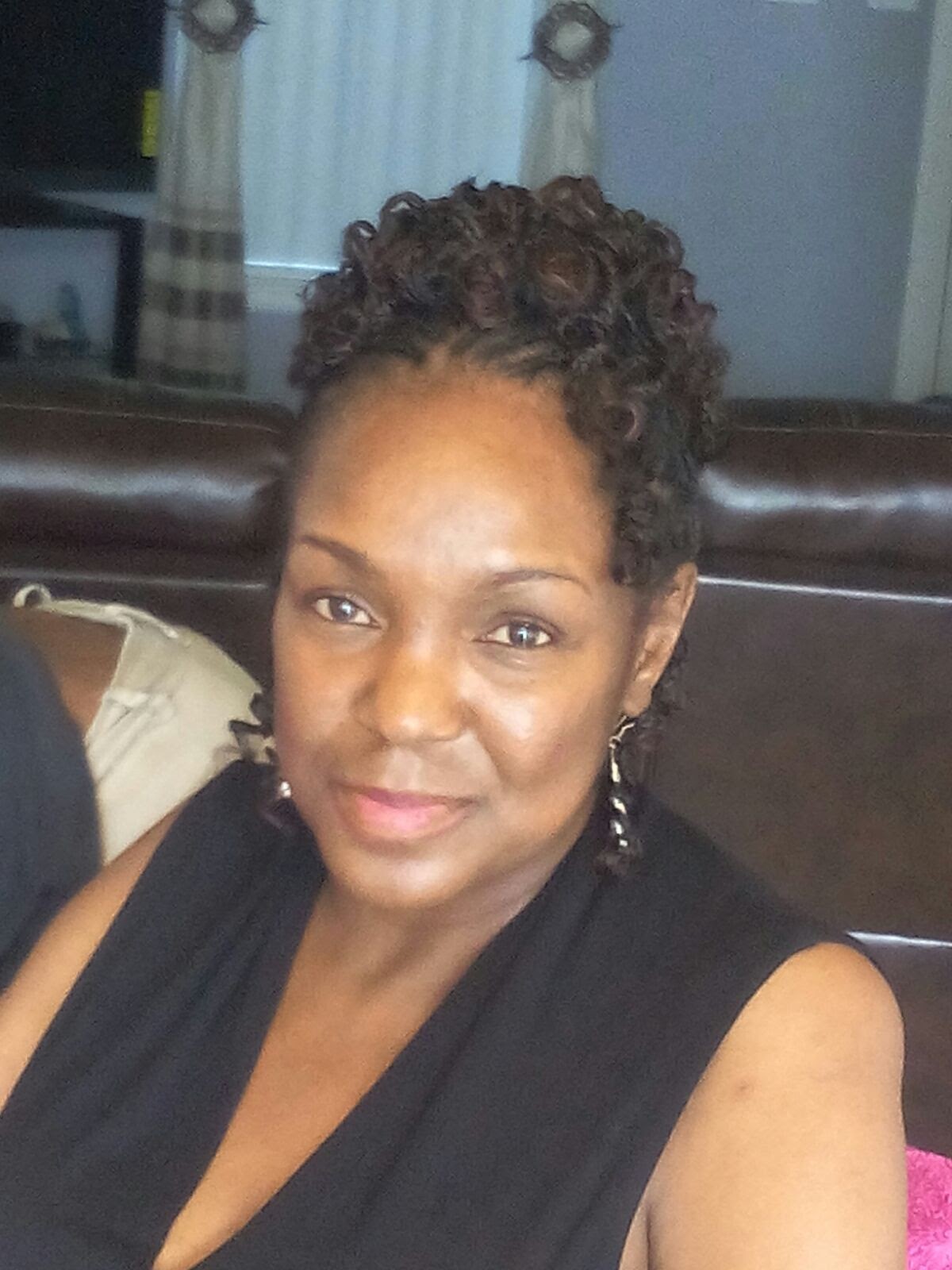 Black curly hairstyle with extensions